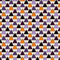 Seamless pattern in Halloween traditional colors. Simple abstract wallpaper with repeated triangles Royalty Free Stock Photo