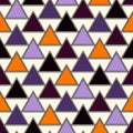 Seamless pattern in Halloween traditional colors. Simple abstract wallpaper with repeated triangles Royalty Free Stock Photo