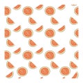 Seamless pattern with halves, slices of pink citrus fruit on a white background. Royalty Free Stock Photo