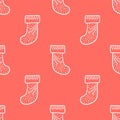 Seamless pattern with the hand drawn Christmas stockings is on the red background. The save with the Clipping Mask Royalty Free Stock Photo