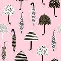 Seamless pattern with hand drawn colorful umbrellas. Childish texture. Great for fabric, textile Vector Illustration