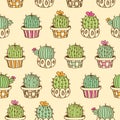 Seamless pattern with hand drawn cute cactuses.