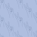 Seamless pattern of hand drawn doodle sketch peace sign. Silhouette contour on a blue background. Hand drawn expression gesture