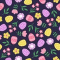 Seamless pattern with hand drawn Easter eggs, flowers and leaves. Cutout colorful plants and eggs on dark blue Royalty Free Stock Photo