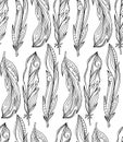 Seamless pattern of hand drawn feathers with boho pattern. Royalty Free Stock Photo