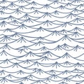 Seamless pattern with hand drawn sea waves in sketch style. Vector endless background in blue colors. Royalty Free Stock Photo