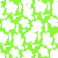 Seamless pattern of hand-drawn watercolor illustrations of Hawaiian hibiscus flowers. Bright tropical flowers on a green