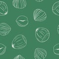 Seamless pattern with hazelnuts. Hand drawn vector.