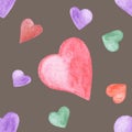 Seamless pattern of multi-colored hearts small and large. The drawing is made with watercolor pencils. Royalty Free Stock Photo