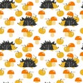 Seamless pattern with hedgehog, apples and mushrooms. Bright vector illustration. Royalty Free Stock Photo