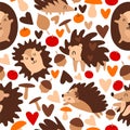 Seamless pattern with hedgehogs, mushrooms, apples, hearts and acorns on a white background. Colorful print for printing on Royalty Free Stock Photo