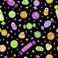 Seamless pattern for the holiday Halloween with candies and sweets. Sugar lollipops of corn grains and candy dots on a Royalty Free Stock Photo
