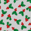 seamless pattern of holly leaves, berries, branches on gray backdrop. Seasonal winter background. Merry Christmas pattern with Royalty Free Stock Photo