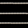 Seamless Pattern - Horizontal White pearl strings on black background Royalty Free Stock Photo