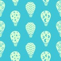 seamless pattern with hot air ballon in light green and white colors on blue background Royalty Free Stock Photo