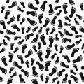 Seamless pattern with human footprints. Black people feet symbol