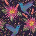 Seamless pattern with hummingbird, tropical flowers,berries and leaves. Exotic flora and fauna.