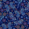 Seamless pattern images of vivid openwork butterflies and flowers on dark blue background. Royalty Free Stock Photo