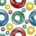 Seamless pattern with isolated colourful rings donuts