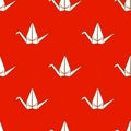 Seamless pattern with Japanese origami cranes on red background