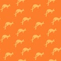 Seamless pattern with Kangaroo silhouette on color background. Vector illustration for card design, poster, fabric Royalty Free Stock Photo