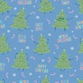 Seamless pattern with kawaii doodle Christmas tree dancing isolated on a blue light background. Royalty Free Stock Photo