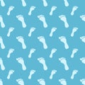 Seamless pattern with kids palm hand and foot prints Royalty Free Stock Photo