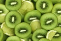 seamless pattern with kiwi and lemon slices on green background Royalty Free Stock Photo