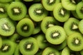 seamless pattern with kiwi slices on green background Royalty Free Stock Photo