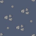 Seamless pattern with a large cluster of meteorites flying in outer space. Cartoon freehand drawing. Vector illustration