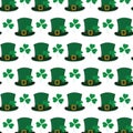 Seamless pattern of Leprechaun hats with ribbon buckle and shamrocks. St. Patrick background texture