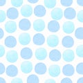Seamless pattern of light blue watercolor circles on a white background