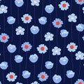 Seamless pattern with light blue wildflowers on a dark background Royalty Free Stock Photo