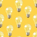 Seamless pattern of light bulbs on bright yellow background, creating cheerful vibe Royalty Free Stock Photo