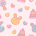 Seamless pattern with little bunnies and pyramid toys