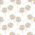 Seamless pattern of lollipops, realistic multicolored spiral candies. Children\'s print. textiles, holiday packaging