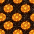 Seamless pattern with luminous pumpkin and cobwebs