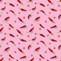 Seamless pattern made of red chili or chilli on pink background. Minimal food pattern. Red hot chilli seamless peppers pattern. Royalty Free Stock Photo