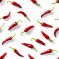 Seamless pattern made of red chili or chilli on white background. Minimal food pattern. Red hot chilli seamless peppers pattern. Royalty Free Stock Photo