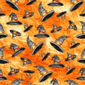 Seamless pattern with magic hat on orange background. Happy Halloween watercolor Royalty Free Stock Photo