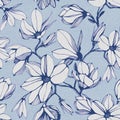 Seamless pattern of magnolia flower on a blue paper background