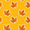 Seamless pattern with maple leaves on yellow background. Abstract autumn texture. Design for fabric, wallpaper, textile and decor Royalty Free Stock Photo