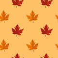 Seamless pattern with maple leaves on yellow background. Abstract autumn texture. Design for fabric, wallpaper, textile and decor Royalty Free Stock Photo