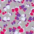 Seamless pattern of mittens on a gray background.