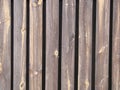 Seamless pattern of modern wall covering with vertical wooden slats for background. Royalty Free Stock Photo