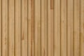 Seamless pattern of modern wall covering with vertical wooden slats for background