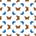 Seamless pattern with monarch butterflies and blue morpho butterflies Royalty Free Stock Photo