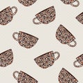 Seamless pattern with mugs decorated with coffee beans Royalty Free Stock Photo