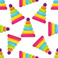 Seamless pattern from multi-colored pyramids on background. cute toys for little kids pattern, design for kids