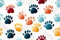 seamless pattern with multicolored footsteps paw prints of animal dog on white background Royalty Free Stock Photo